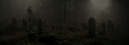 A spooky cemetery landscape set against a full moon