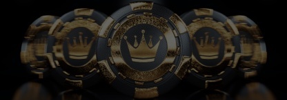 A row of black and gold poker chips with crowns on against a dark background 