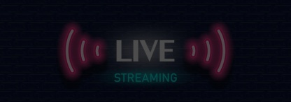 A live streaming sign on a dark brick wall background