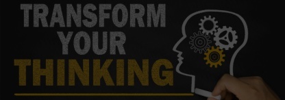 A thinking concept of a blackboard with ‘transform your thinking’ written in white and yellow chalk