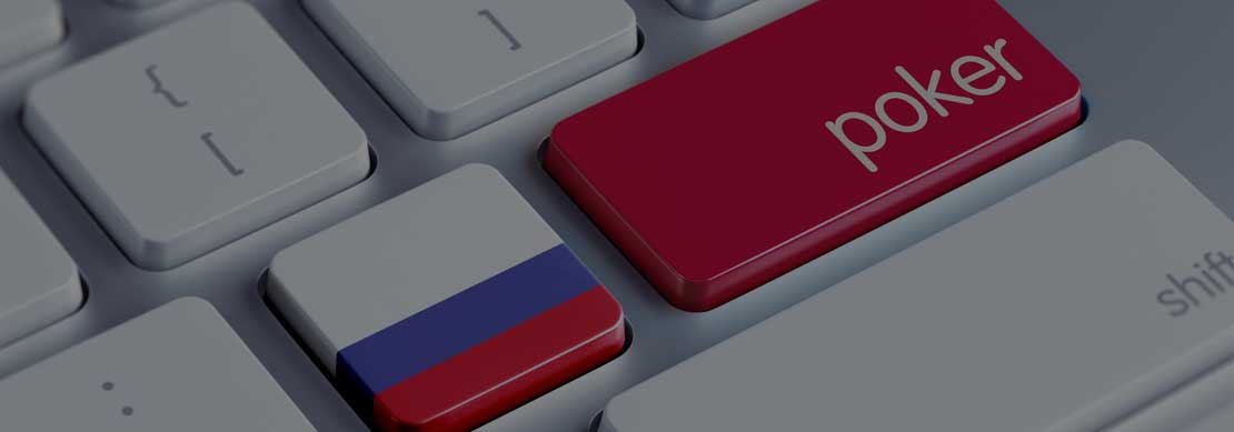 computer keyboard with the word Poker on the enter key, and a Russian flag on the key to the left