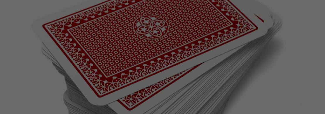 a deck of cards sitting face down on a table